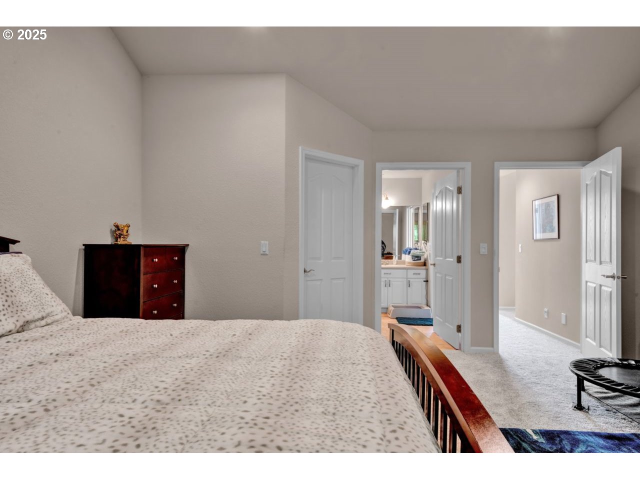 2131 Willow Loop Florence, OR 97439 - Photo 33 of 48 a bedroom with a bed and a table