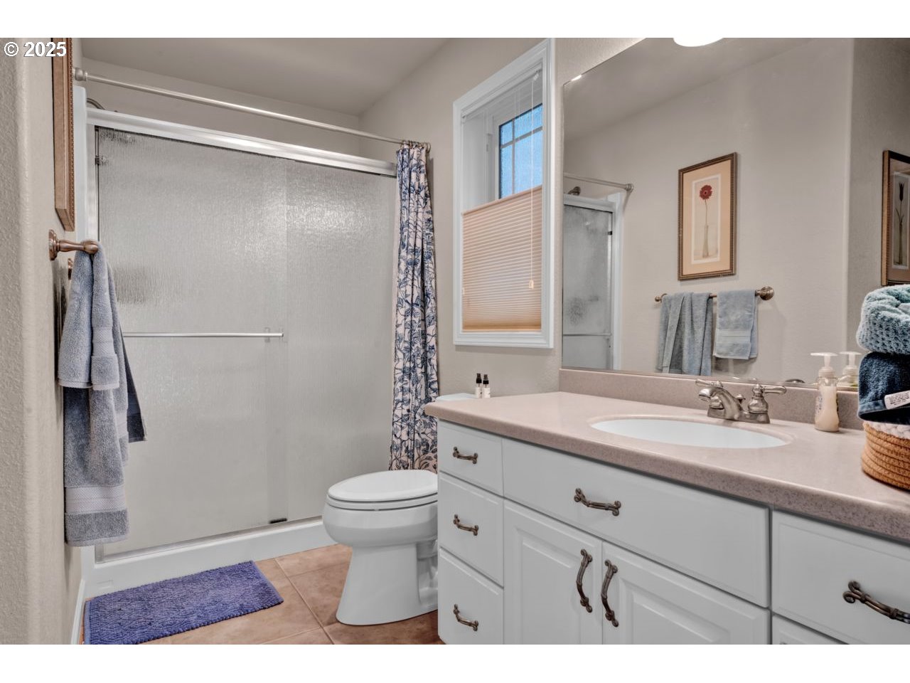 2131 Willow Loop Florence, OR 97439 - Photo 34 of 48 a bathroom with a sink a toilet and shower