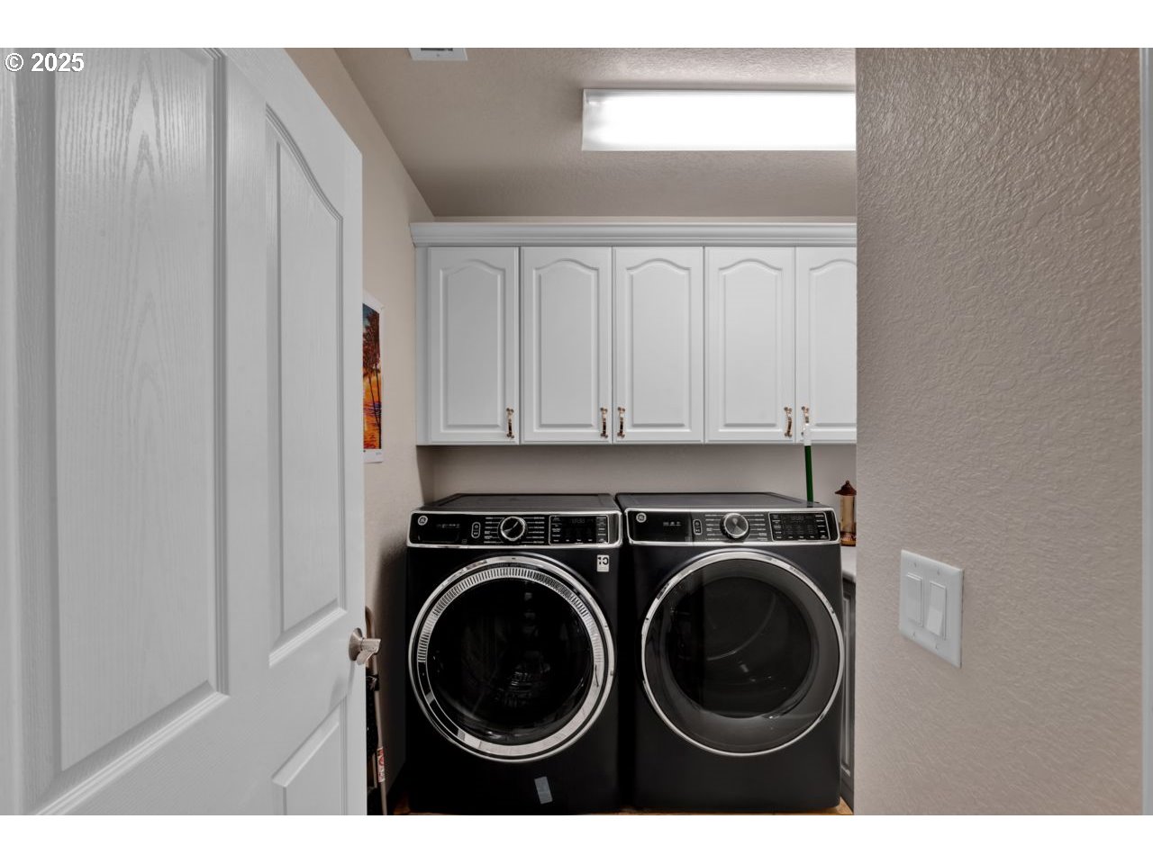 2131 Willow Loop Florence, OR 97439 - Photo 37 of 48 a utility room with sink dryer and washer
