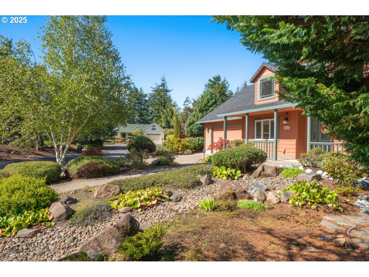 2131 Willow Loop Florence, OR 97439 - Photo 40 of 48 a view of a house with a yard