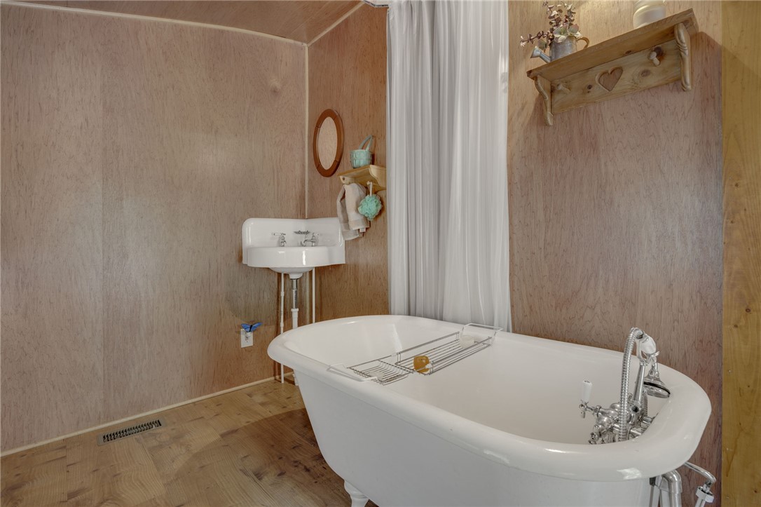 437 West Gate Road Pickens, SC 29671 - Photo 44 of 47 This bathroom features a classic clawfoot tub, offering a timeless aesthetic.