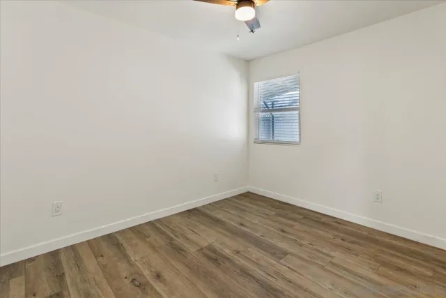 a patio with table and chairs