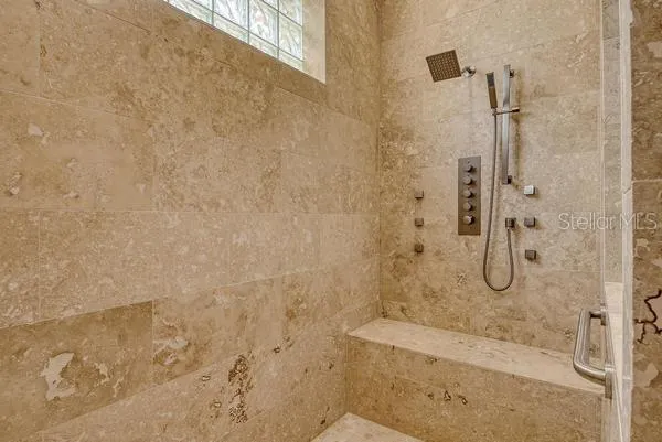 a bathroom with a bath tub