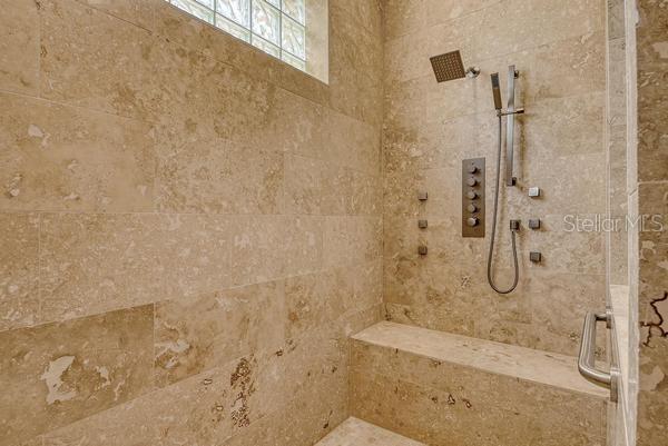 9477 Cedar Ridge Lane Sarasota, FL 34238 - Photo 23 of 51 a bathroom with a bath tub