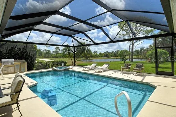a view of a swimming pool with a porch