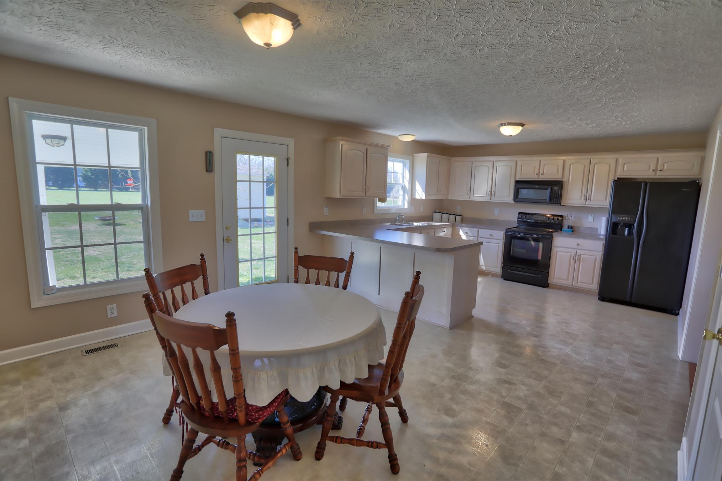 240 Bowling Branch Road Cottontown, TN 37048 - Photo 5 of 18 Kitchen/Dining Area