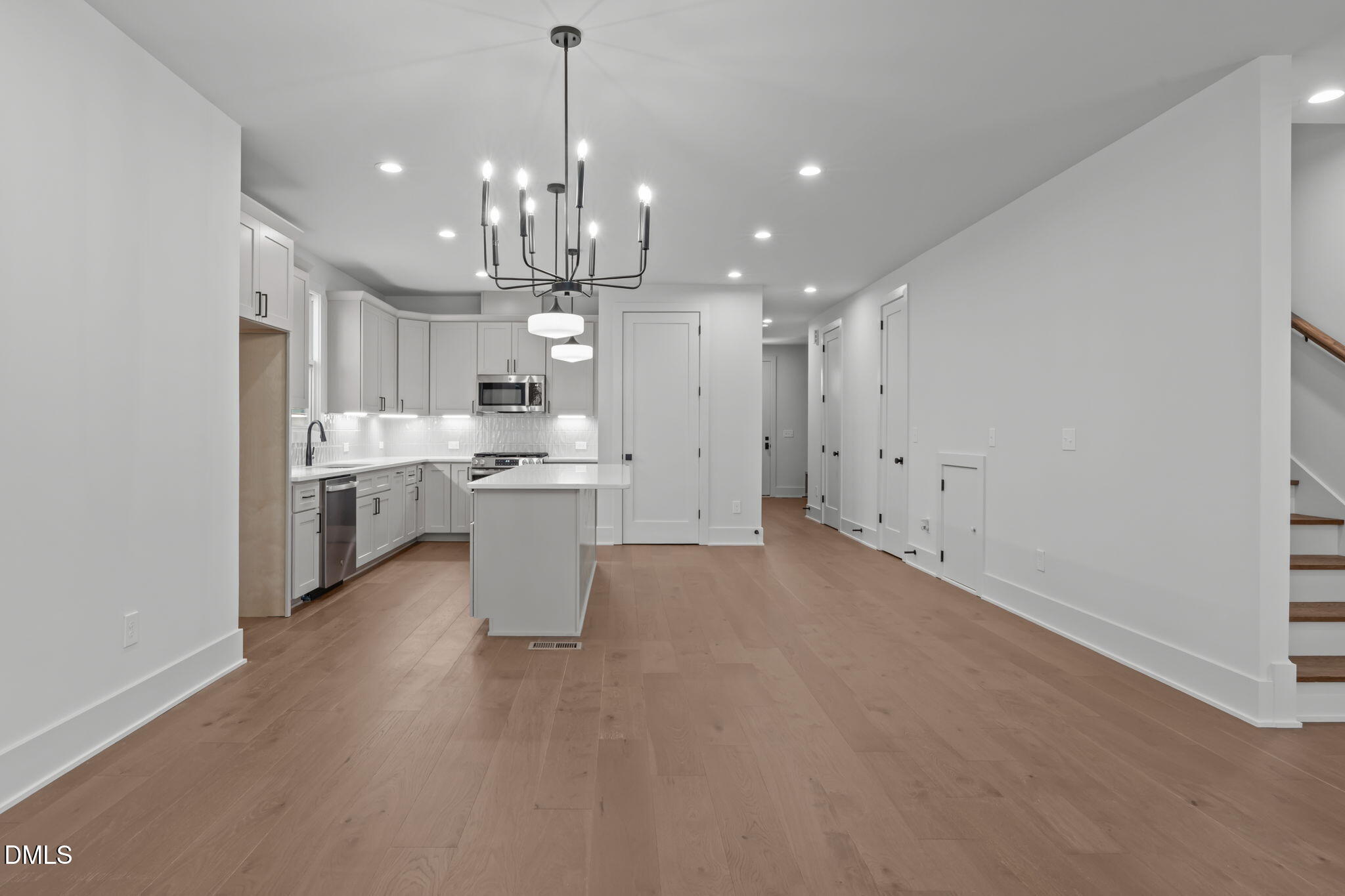635 Conover Road, Unit A Durham, NC 27703 - Photo 15 of 48 a view of a kitchen with a sink and cabinets