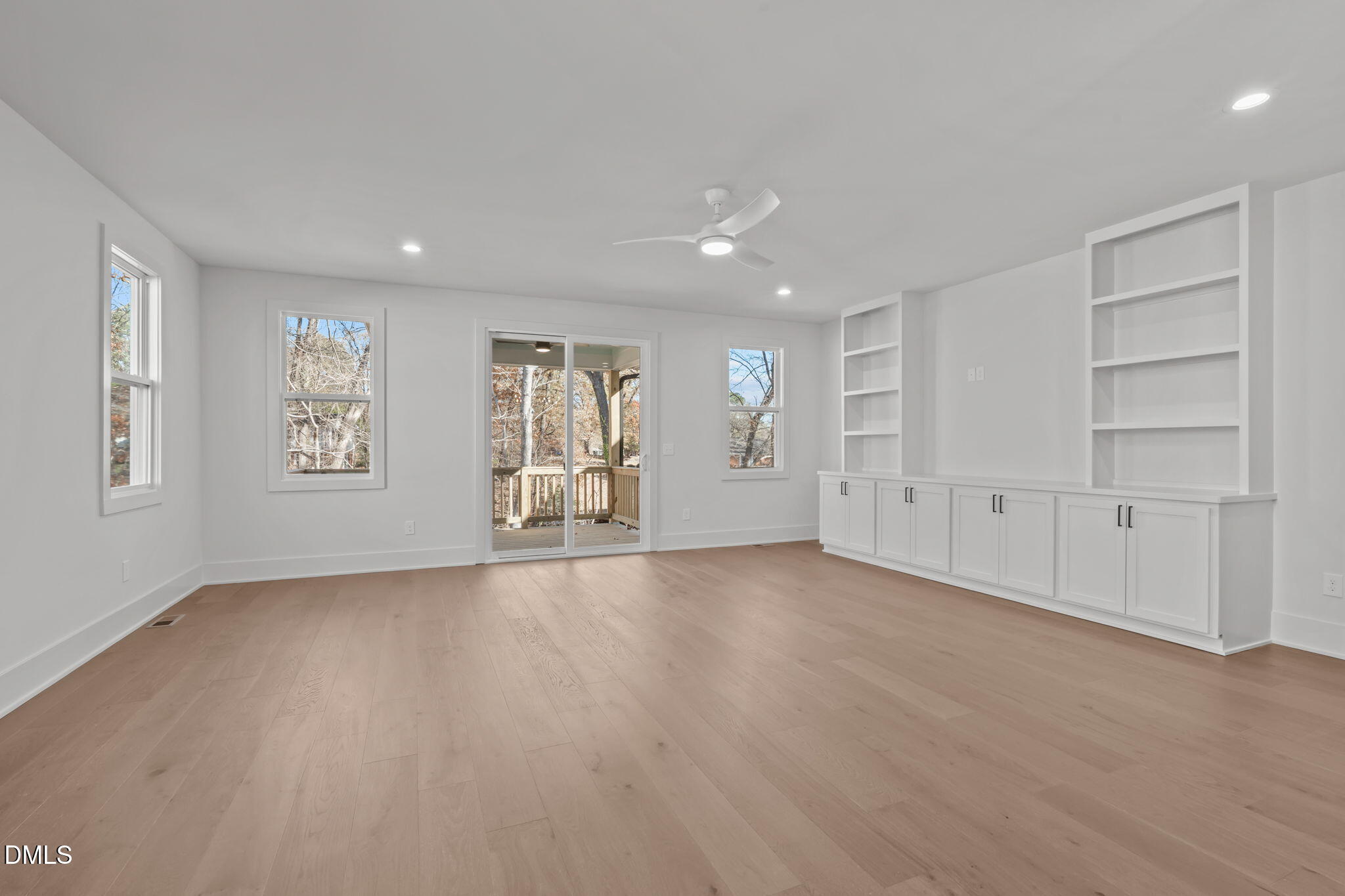 635 Conover Road, Unit A Durham, NC 27703 - Photo 17 of 48 an empty room with windows and closet
