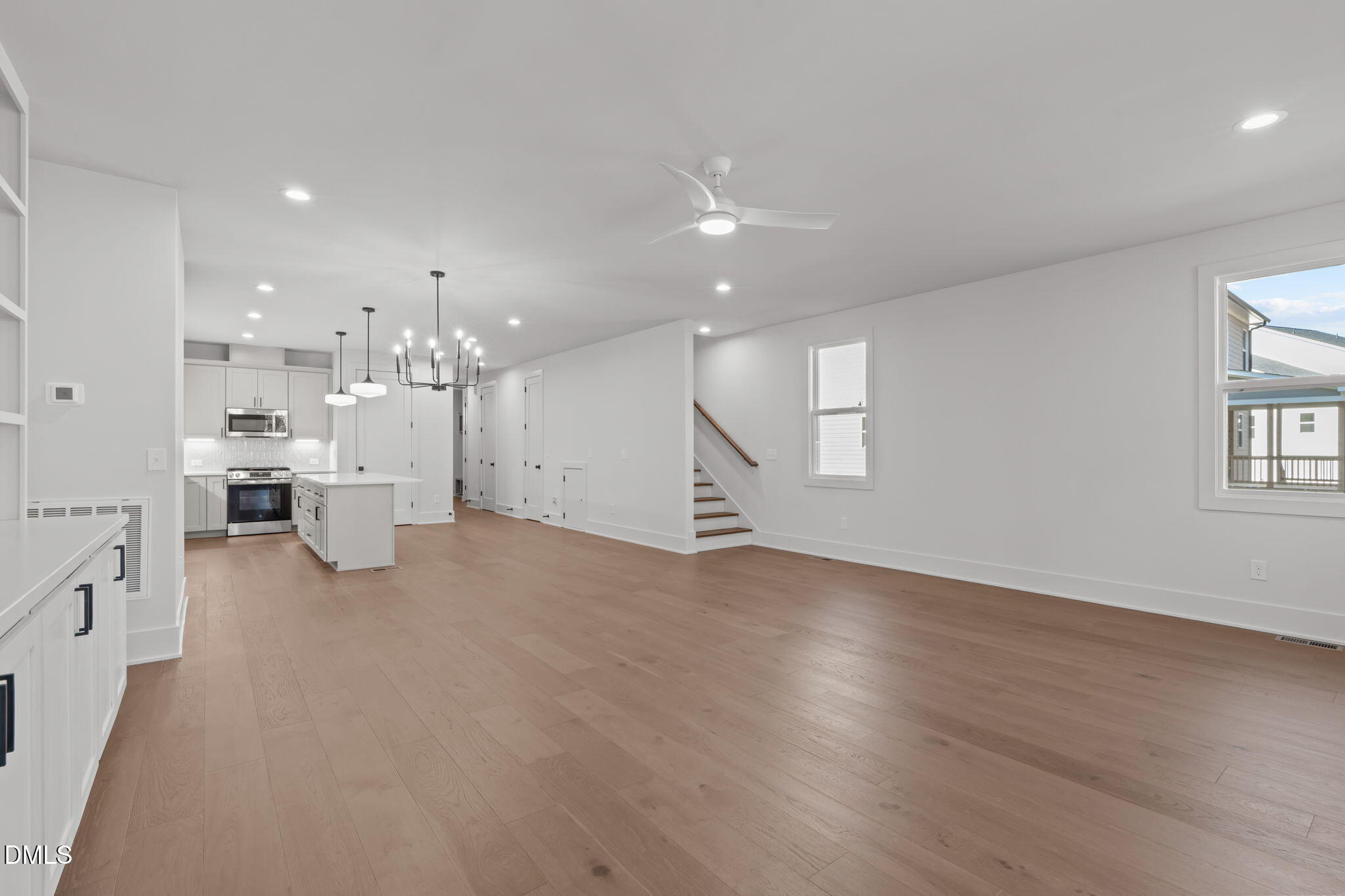 635 Conover Road, Unit A Durham, NC 27703 - Photo 21 of 48 a view of a kitchen with a sink and a refrigerator
