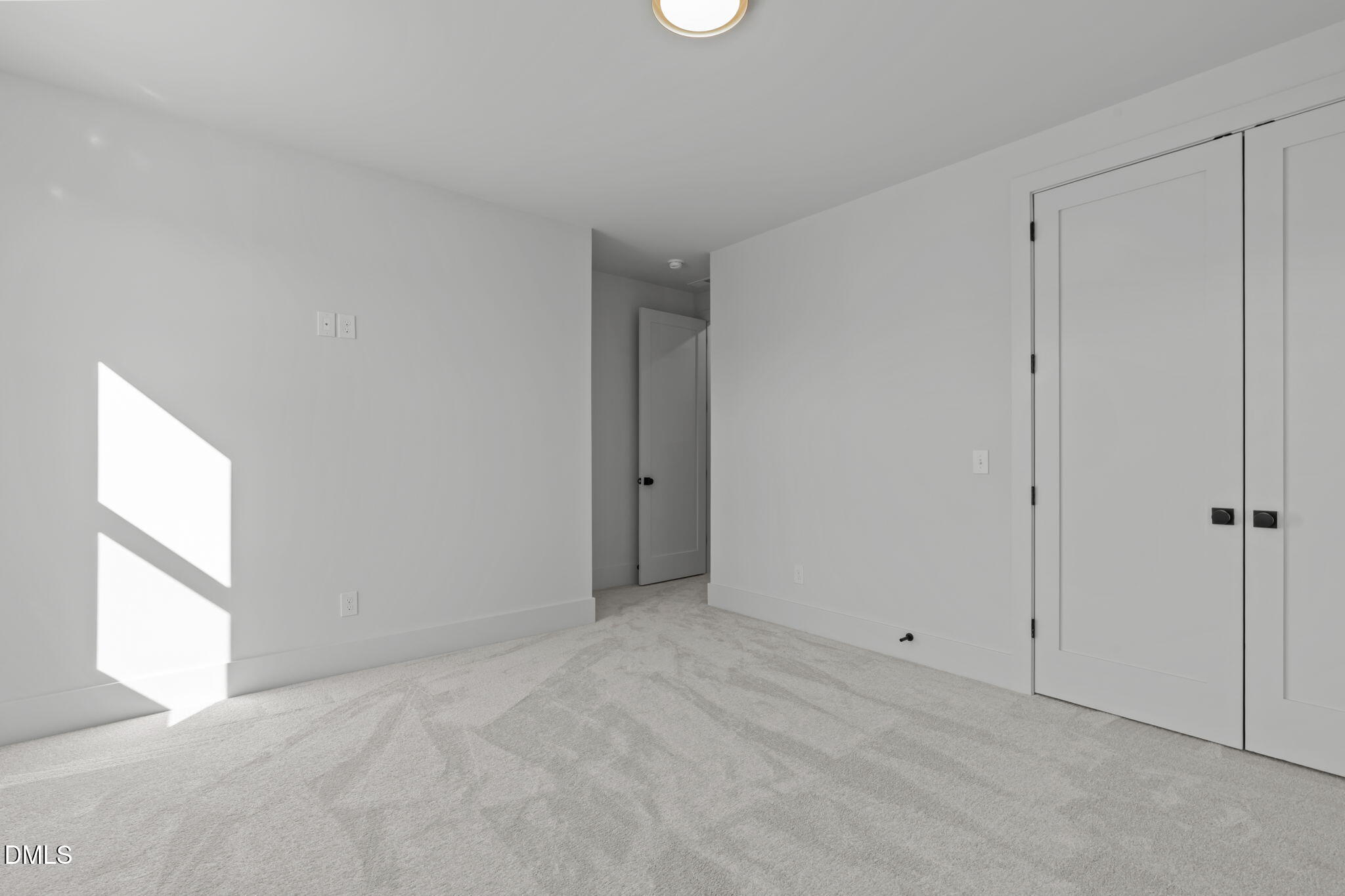 635 Conover Road, Unit A Durham, NC 27703 - Photo 39 of 48 a view of an empty room with a window