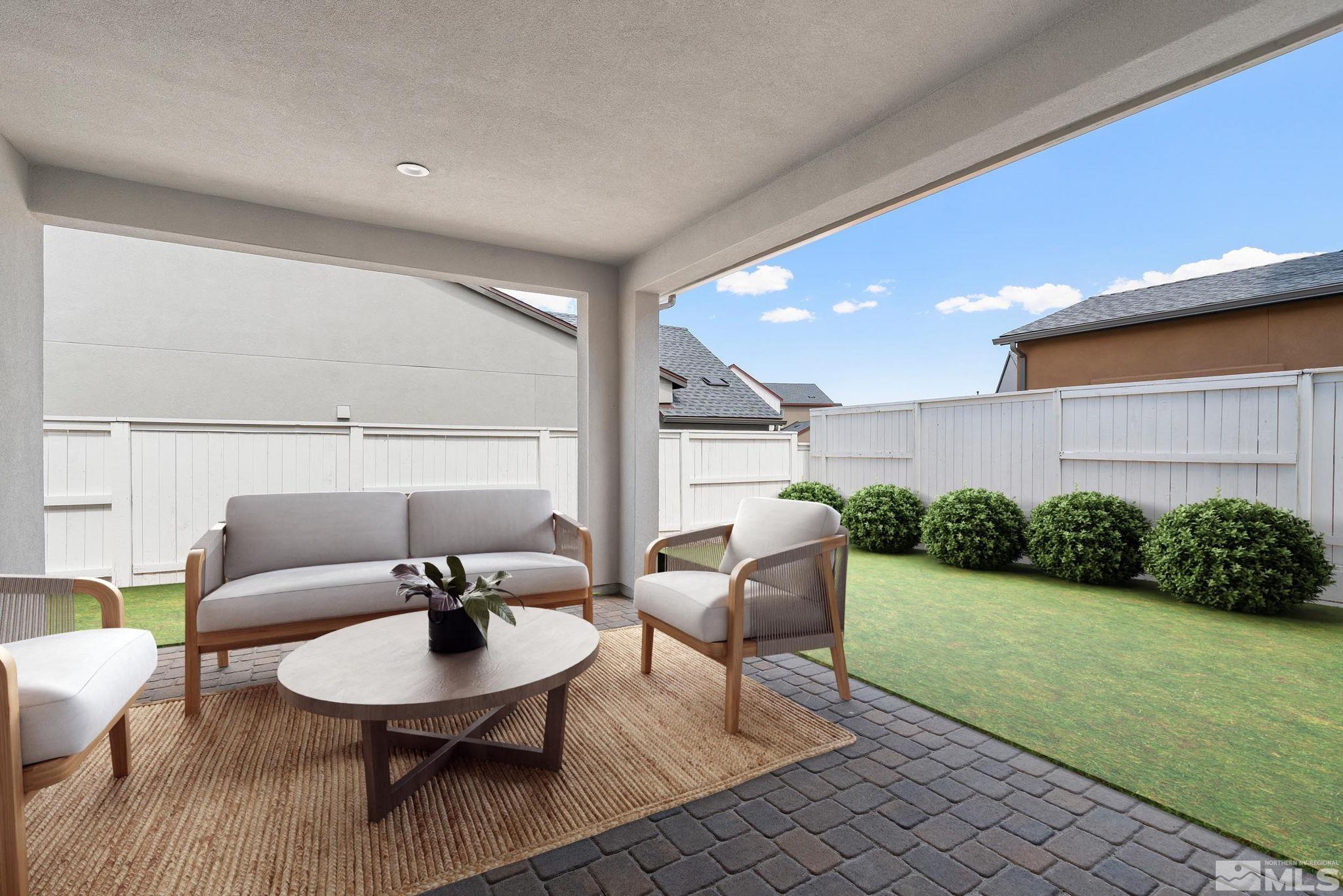 5526 Western Rider Trail, Unit HOMESITE 57 Reno, NV 89511 - Photo 15 of 39 a outdoor living space with furniture and garden view