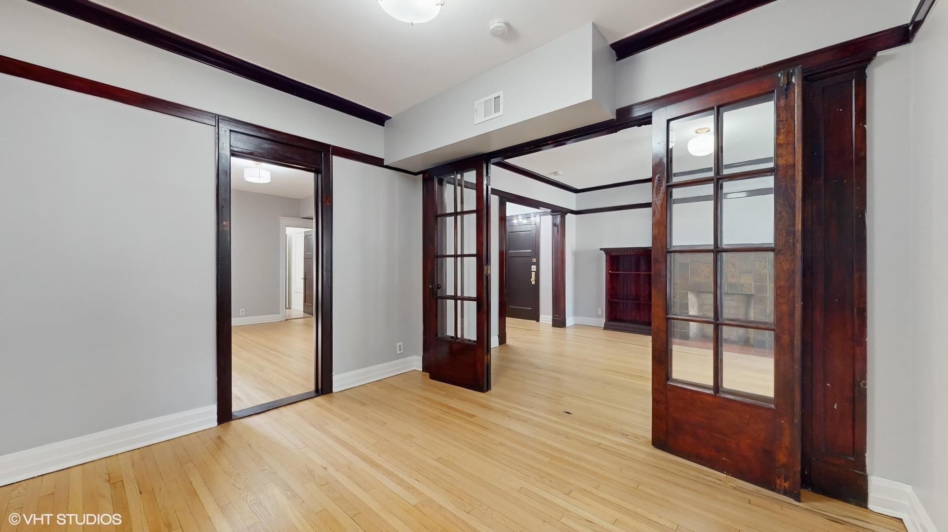 5237 South Michigan Avenue, Unit 1N Chicago, IL 60615 - Photo 12 of 47 a view of entryway with wooden floor