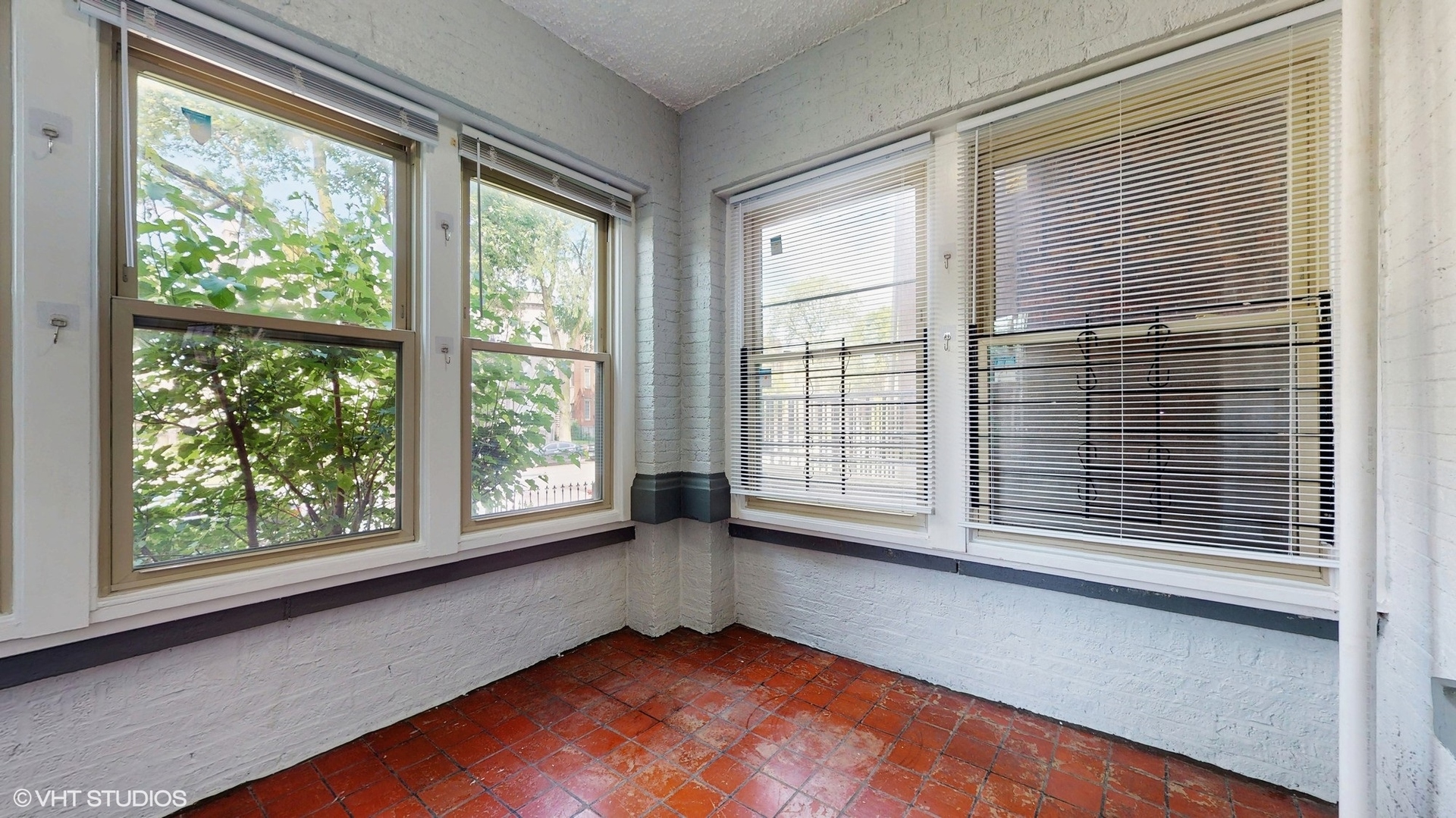 5237 South Michigan Avenue, Unit 1N Chicago, IL 60615 - Photo 13 of 47 a view of an empty room with a window