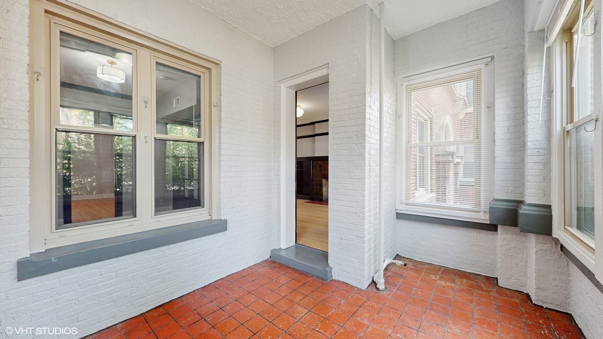 5237 South Michigan Avenue, Unit 1N Chicago, IL 60615 - Photo 14 of 47 a view of an empty room with a window
