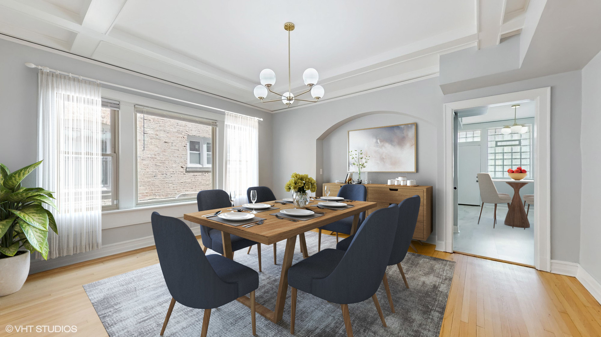 5237 South Michigan Avenue, Unit 1N Chicago, IL 60615 - Photo 18 of 47 a view of a dining room with furniture window and wooden floor