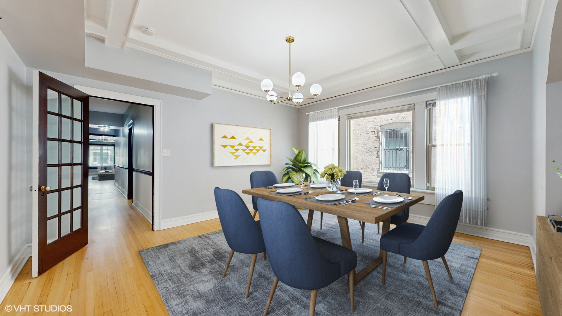 5237 South Michigan Avenue, Unit 1N Chicago, IL 60615 - Photo 20 of 47 a view of a dining room with furniture window and wooden floor