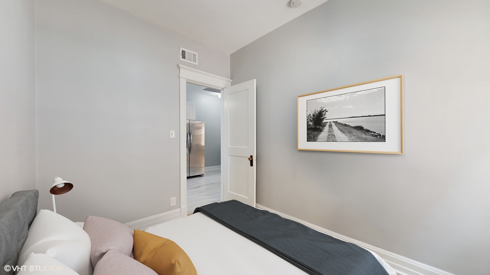 5237 South Michigan Avenue, Unit 1N Chicago, IL 60615 - Photo 36 of 47 a bedroom with a bed and a couch