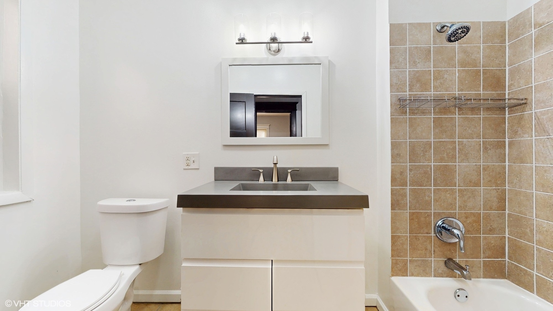 5237 South Michigan Avenue, Unit 1N Chicago, IL 60615 - Photo 39 of 47 a bathroom with a sink toilet and vanity