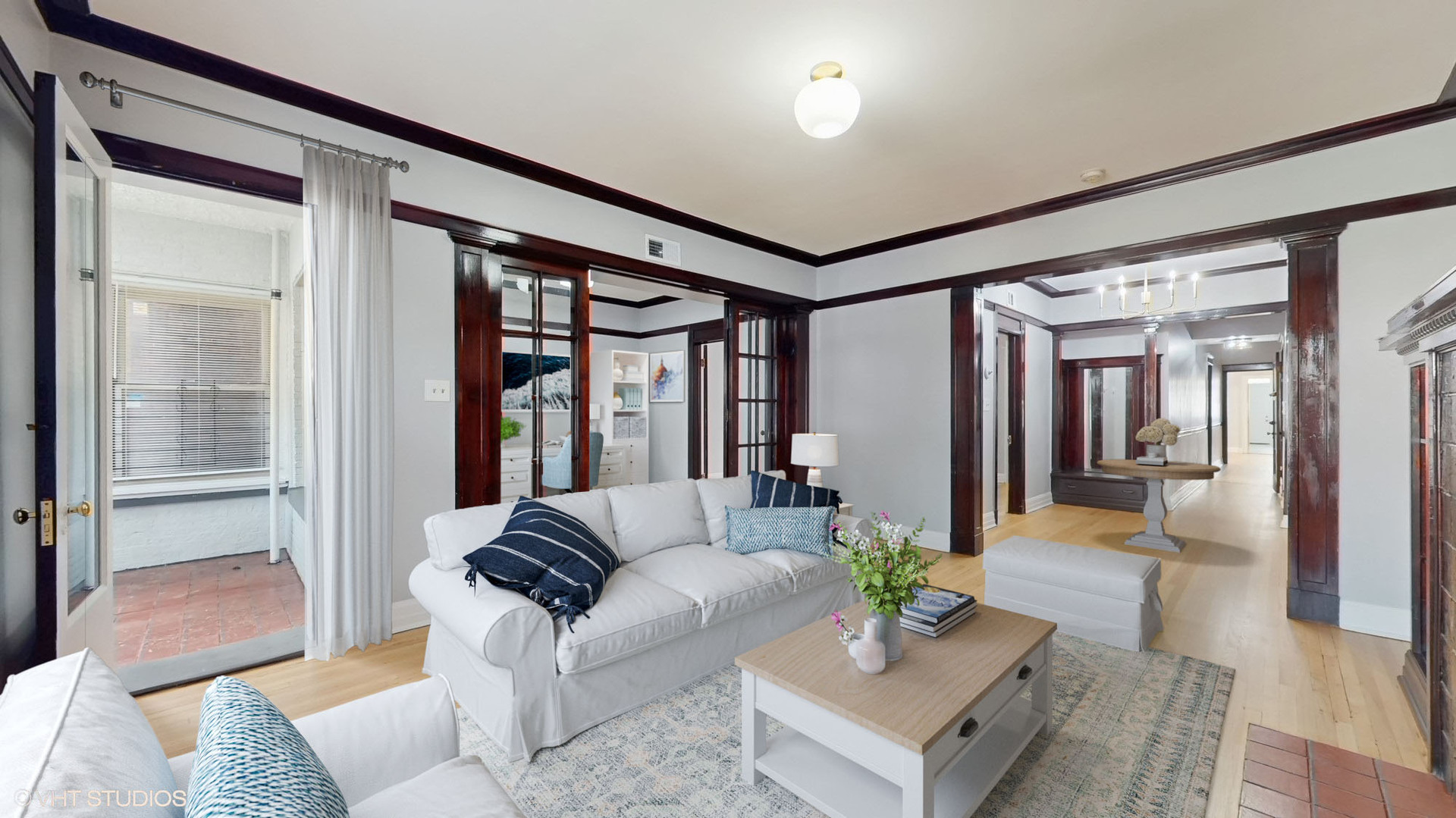 5237 South Michigan Avenue, Unit 1N Chicago, IL 60615 - Photo 5 of 47 a living room with furniture and a large window