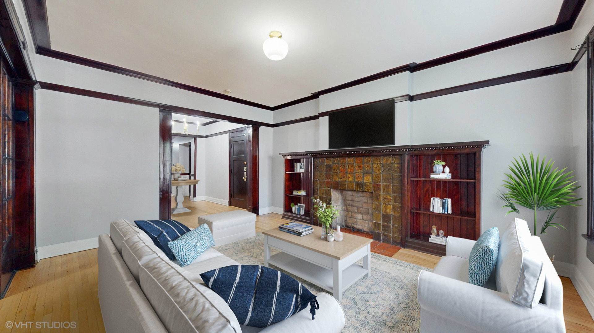 5237 South Michigan Avenue, Unit 1N Chicago, IL 60615 - Photo 7 of 47 a living room with furniture and a flat screen tv