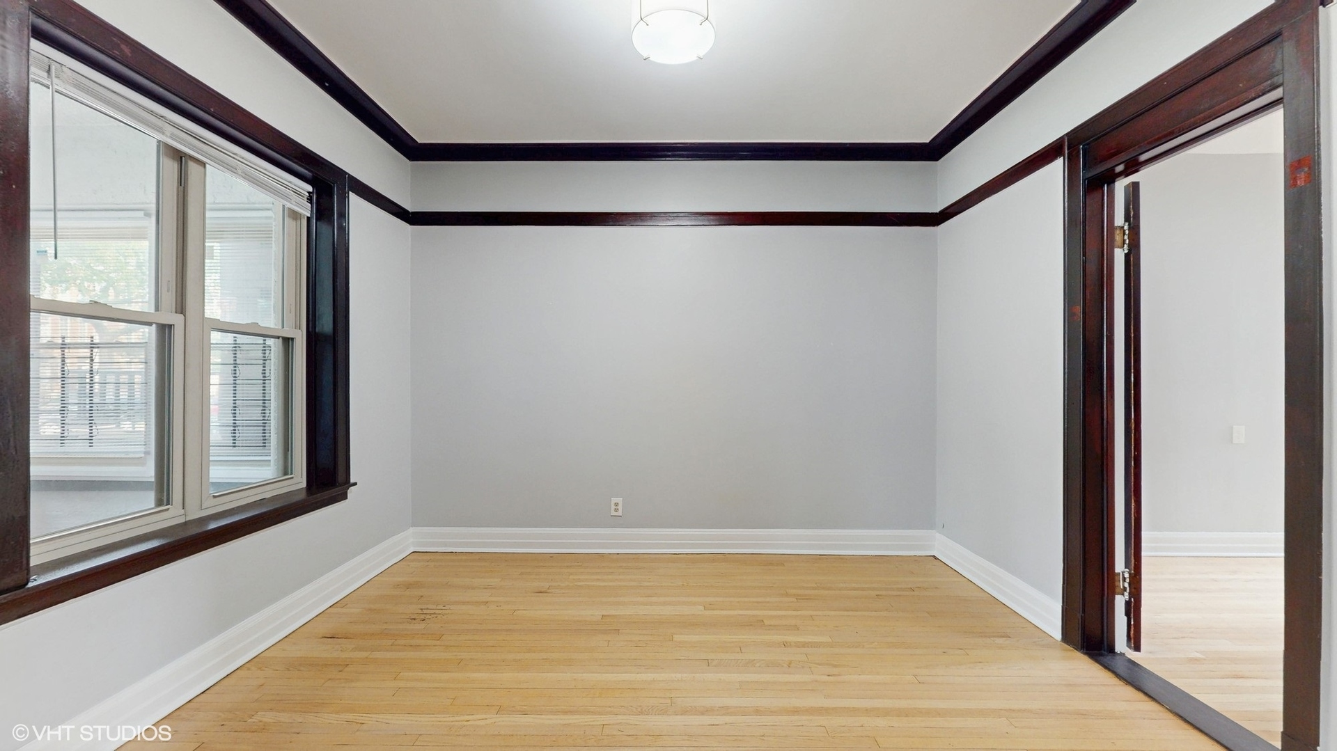 5237 South Michigan Avenue, Unit 1N Chicago, IL 60615 - Photo 10 of 47 a view of an empty room