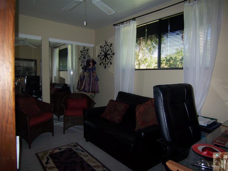 70170 Chappel Road Rancho Mirage, CA 92270 - Photo 10 of 14 a living room with furniture and a window