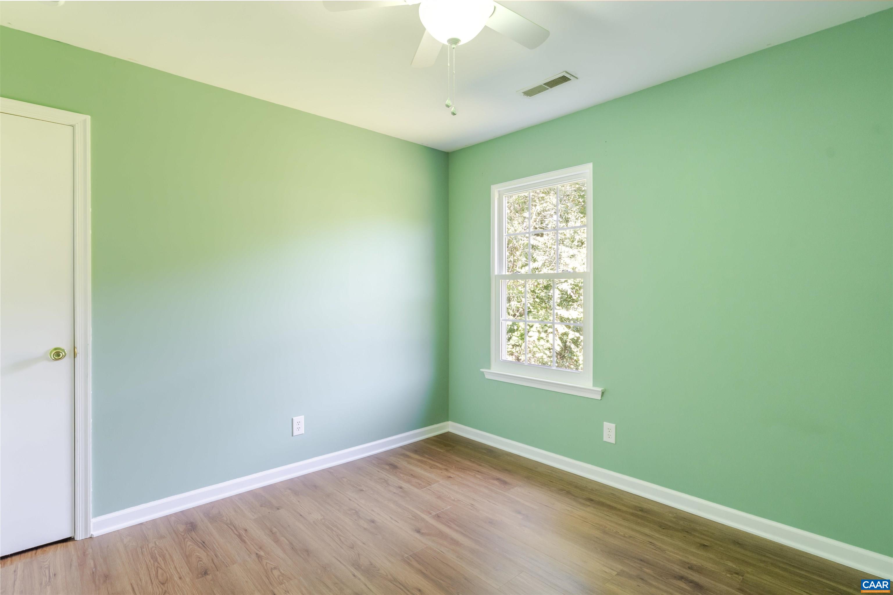 28 Bernice Lane Ruckersville, VA 22968 - Photo 31 of 40 a view of an empty room with window and wooden floor