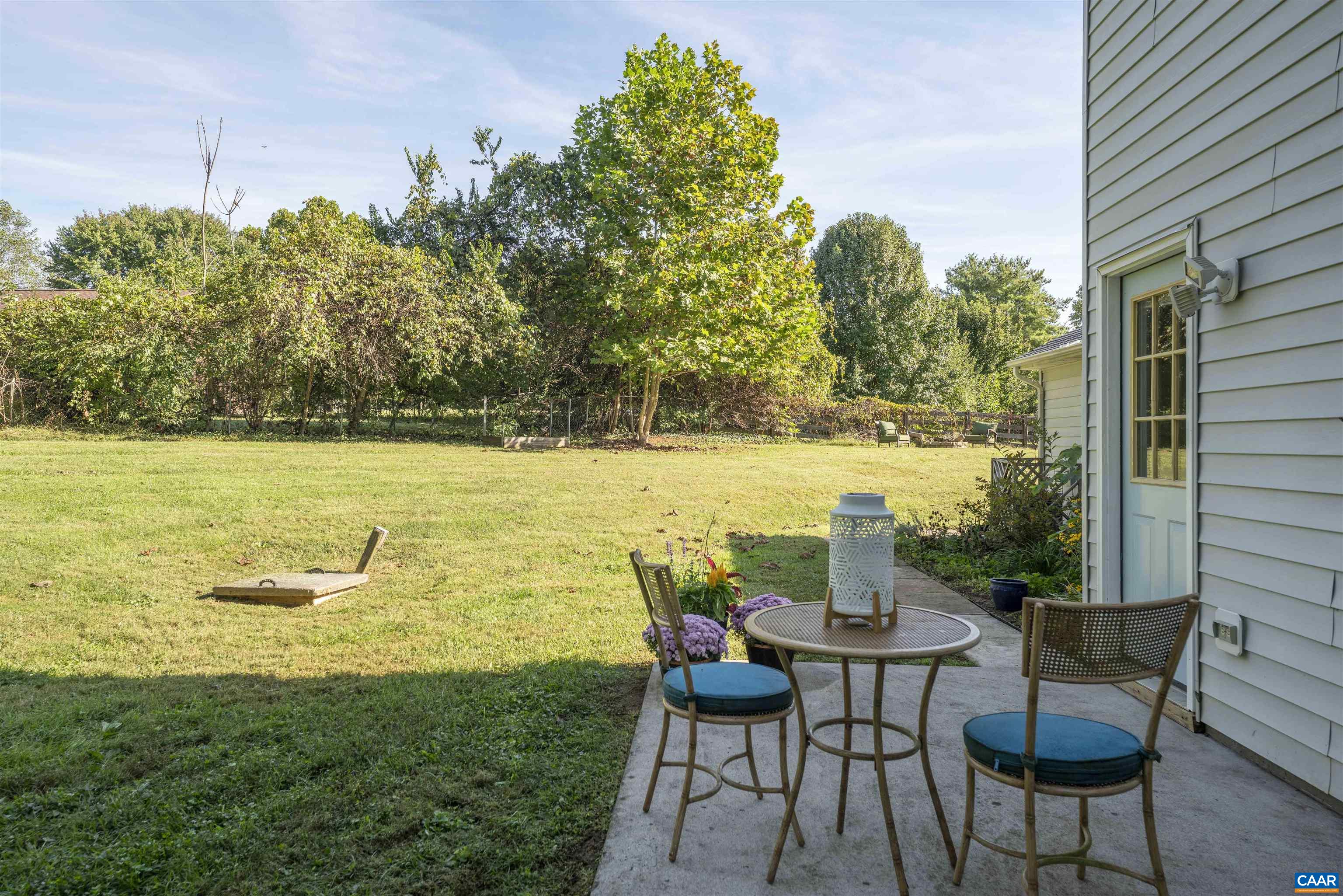 28 Bernice Lane Ruckersville, VA 22968 - Photo 34 of 40 a view of a chairs and table on the deck