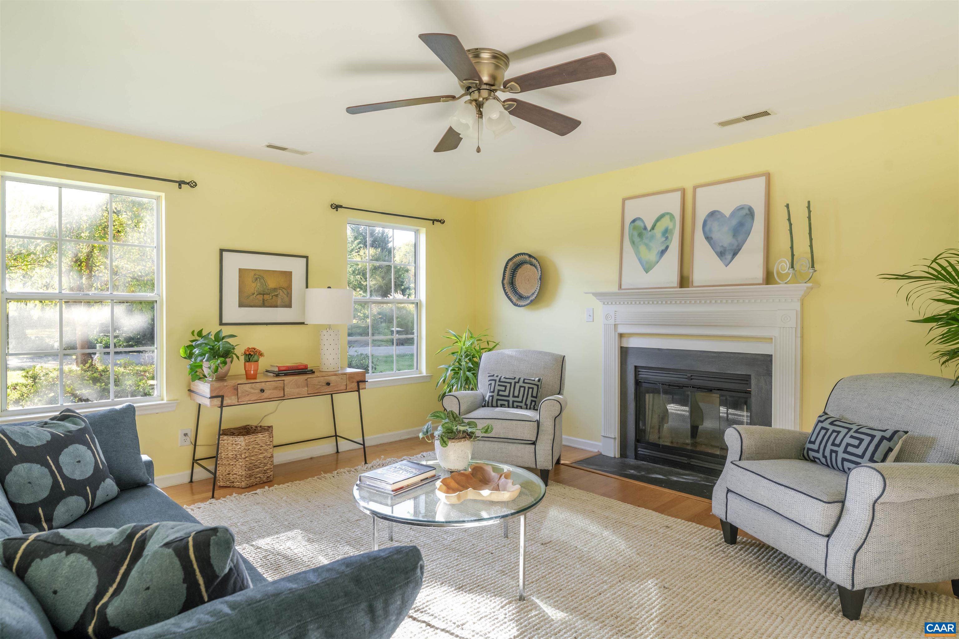 28 Bernice Lane Ruckersville, VA 22968 - Photo 4 of 40 a living room with furniture and a fireplace