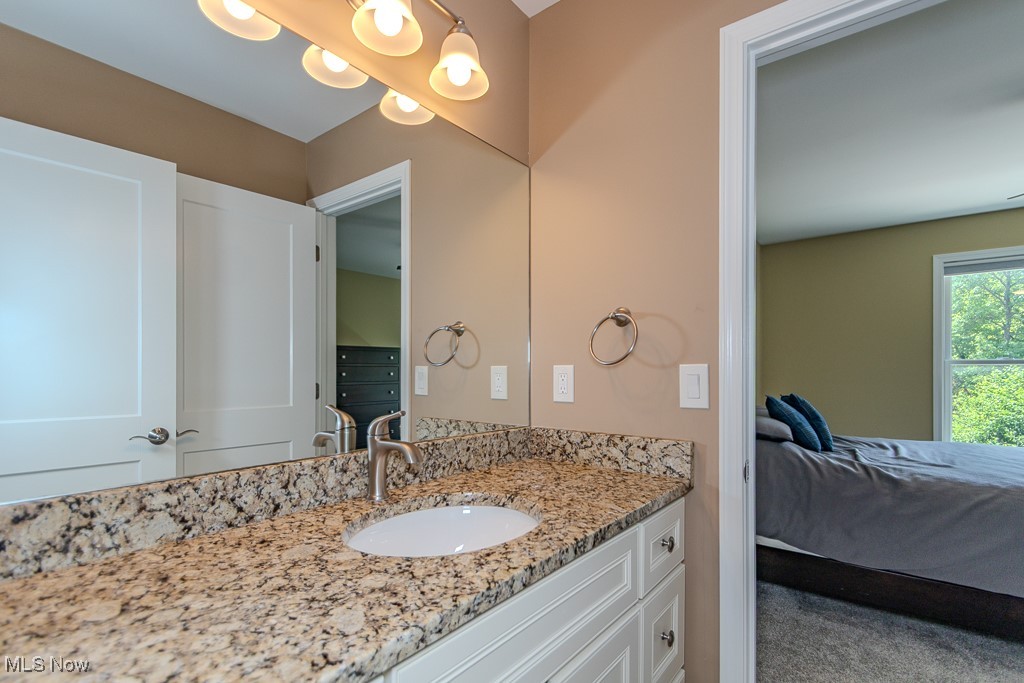 8675 Auburn Road Chardon, OH 44024 - Photo 28 of 35 Ensuite bathroom featuring vanity