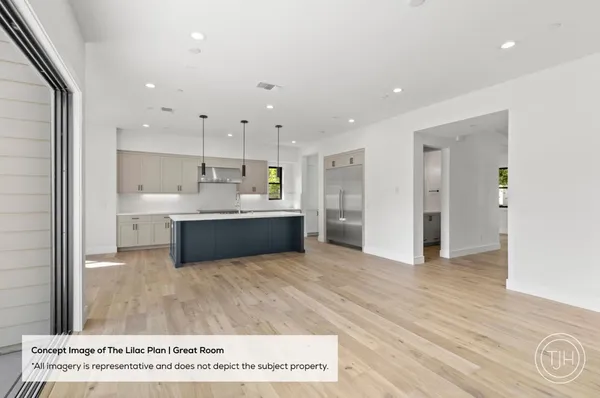 a view of kitchen with wooden floor