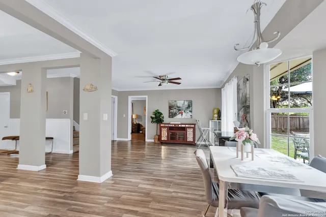 a view of a livingroom with furniture window and wooden floor
