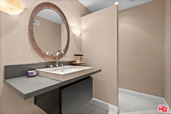 a view of a house with pool backyard and chairs