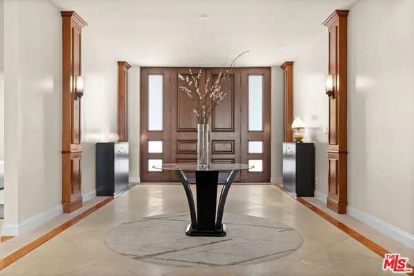 a view of a living room and dining room