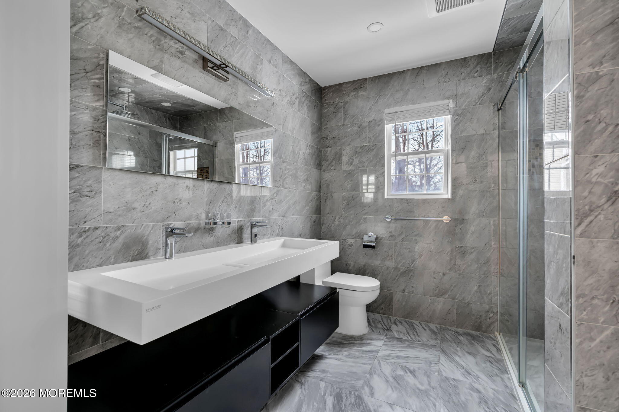 482 Meadowood Road Jackson, NJ 08527 - Photo 1 of 51 a bathroom with a sink and a mirror