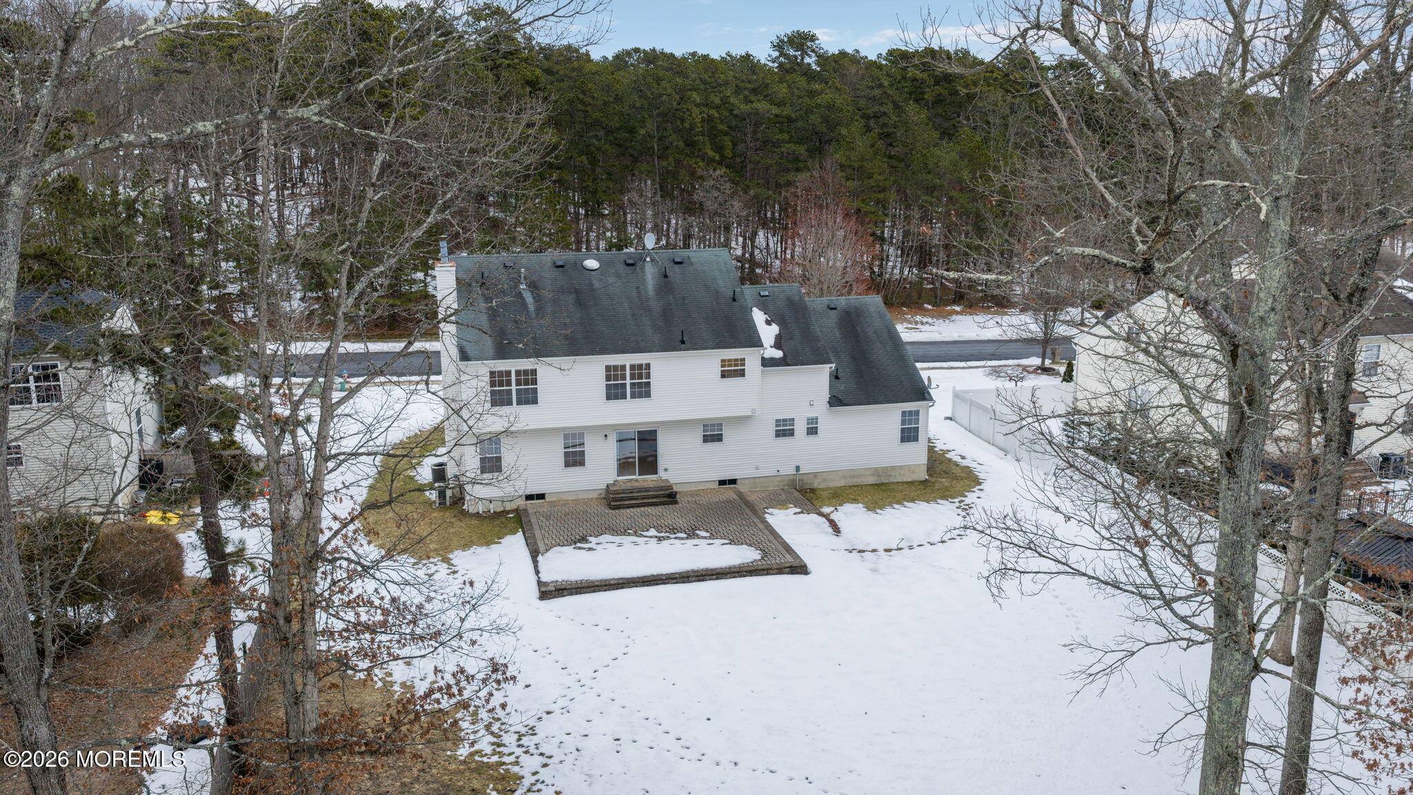 482 Meadowood Road Jackson, NJ 08527 - Photo 13 of 51 a view of backyard of a house with a table and chairs