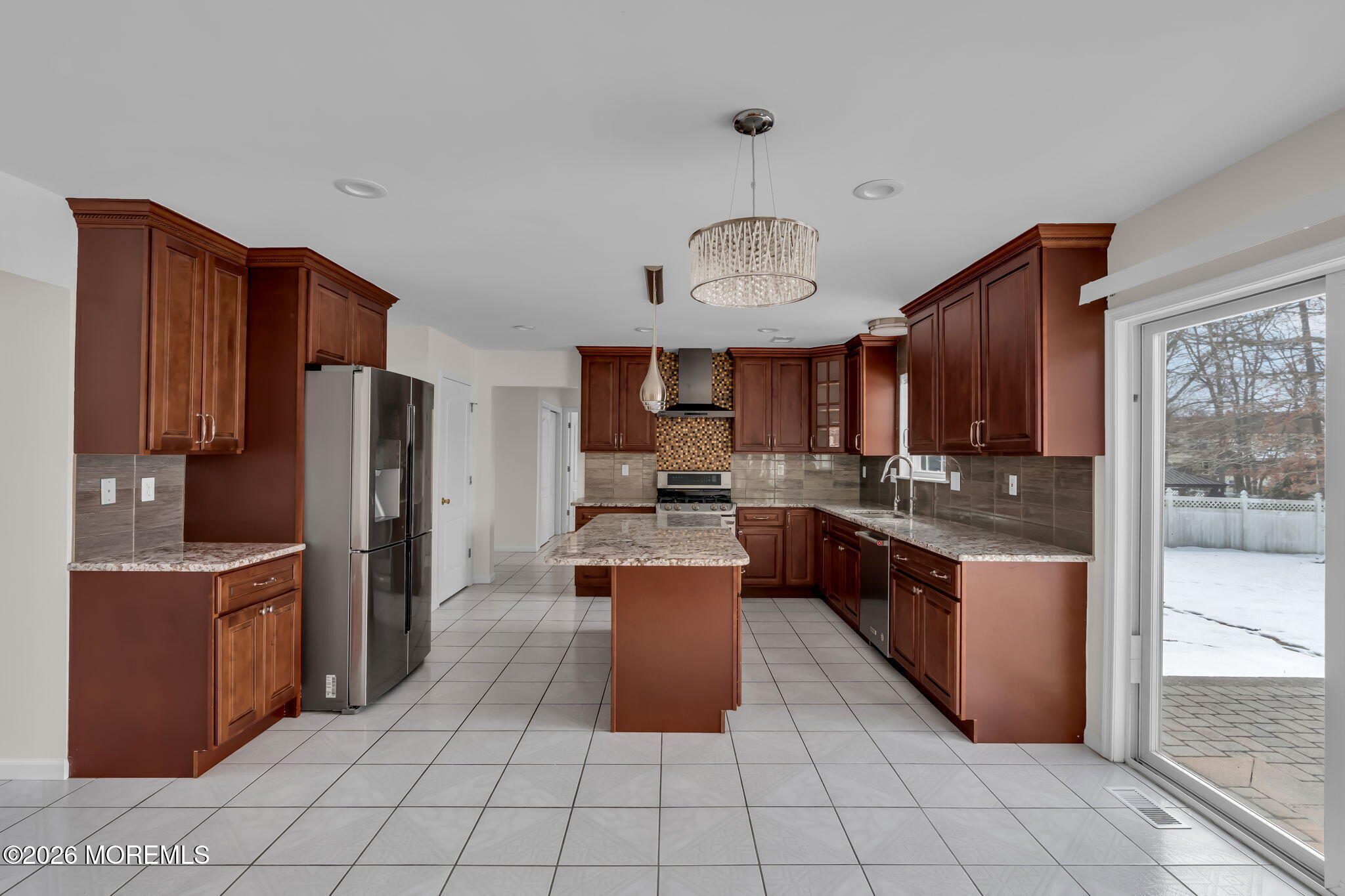 482 Meadowood Road Jackson, NJ 08527 - Photo 16 of 51 a large kitchen with stainless steel appliances lots of counter top space cabinets and a refrigerator