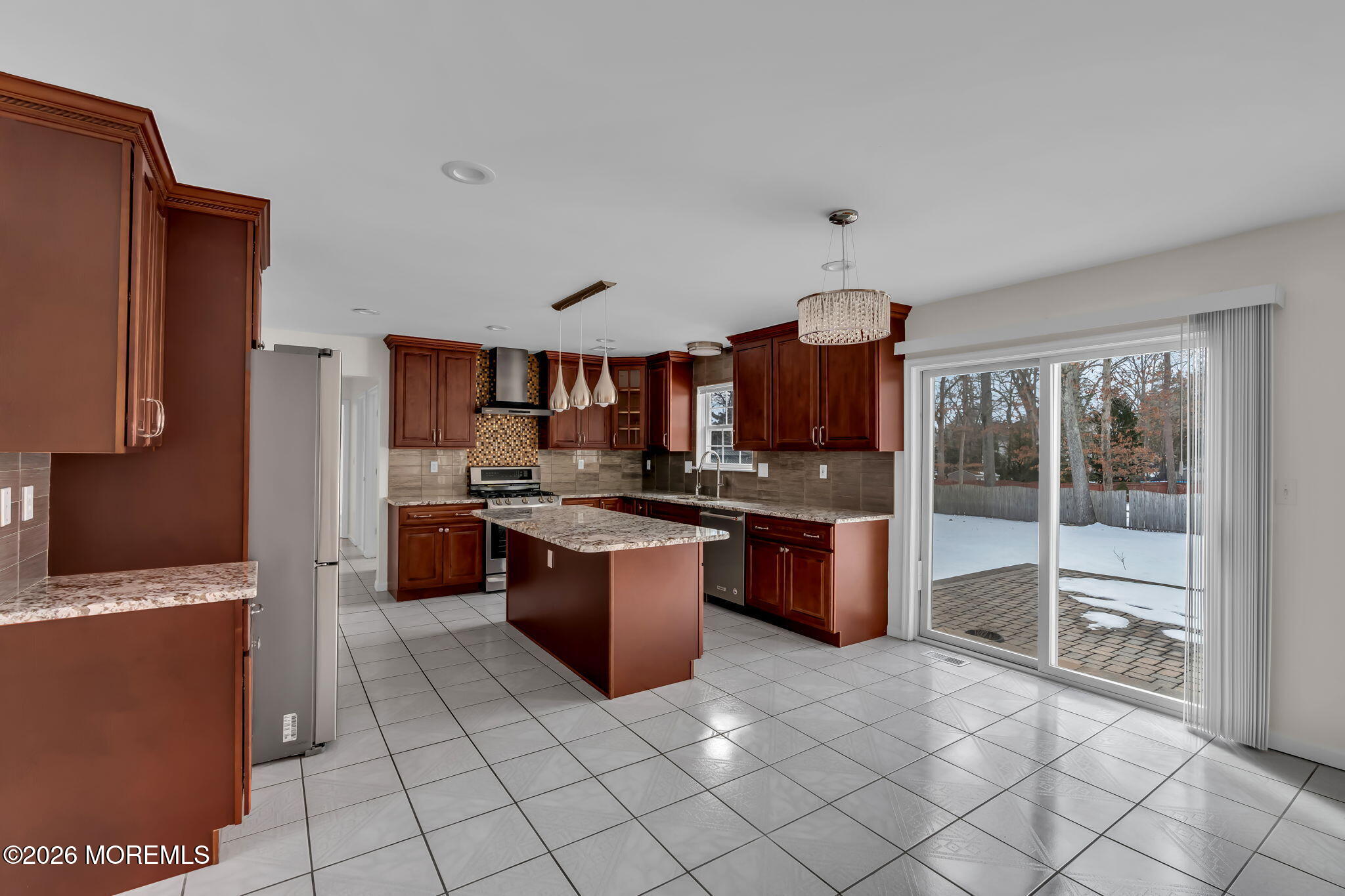482 Meadowood Road Jackson, NJ 08527 - Photo 17 of 51 a large kitchen with a large counter top appliances and cabinets