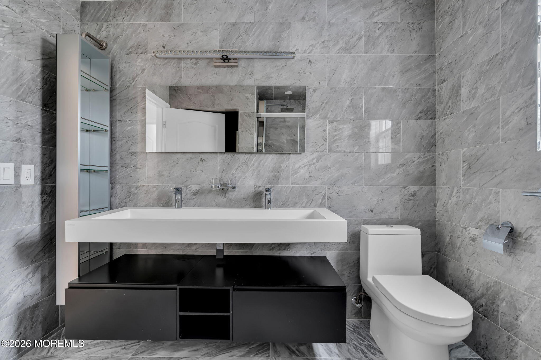 482 Meadowood Road Jackson, NJ 08527 - Photo 3 of 51 a bathroom with a toilet a sink and mirror