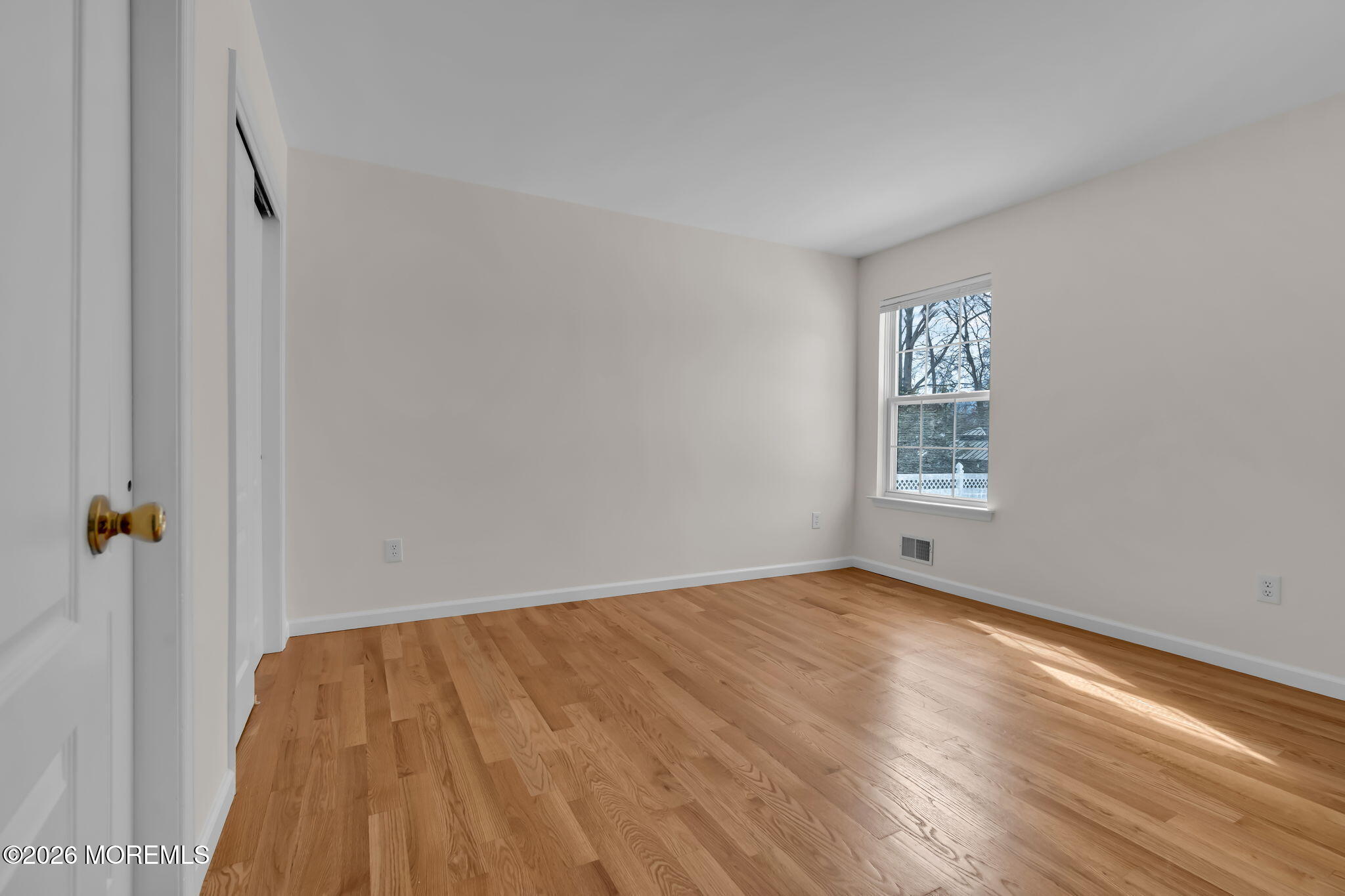 482 Meadowood Road Jackson, NJ 08527 - Photo 32 of 51 an empty room with windows