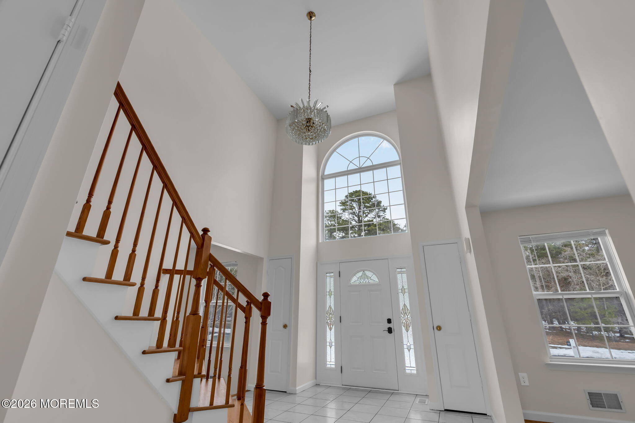 482 Meadowood Road Jackson, NJ 08527 - Photo 40 of 51 a view of an entryway with wooden floor and stairs