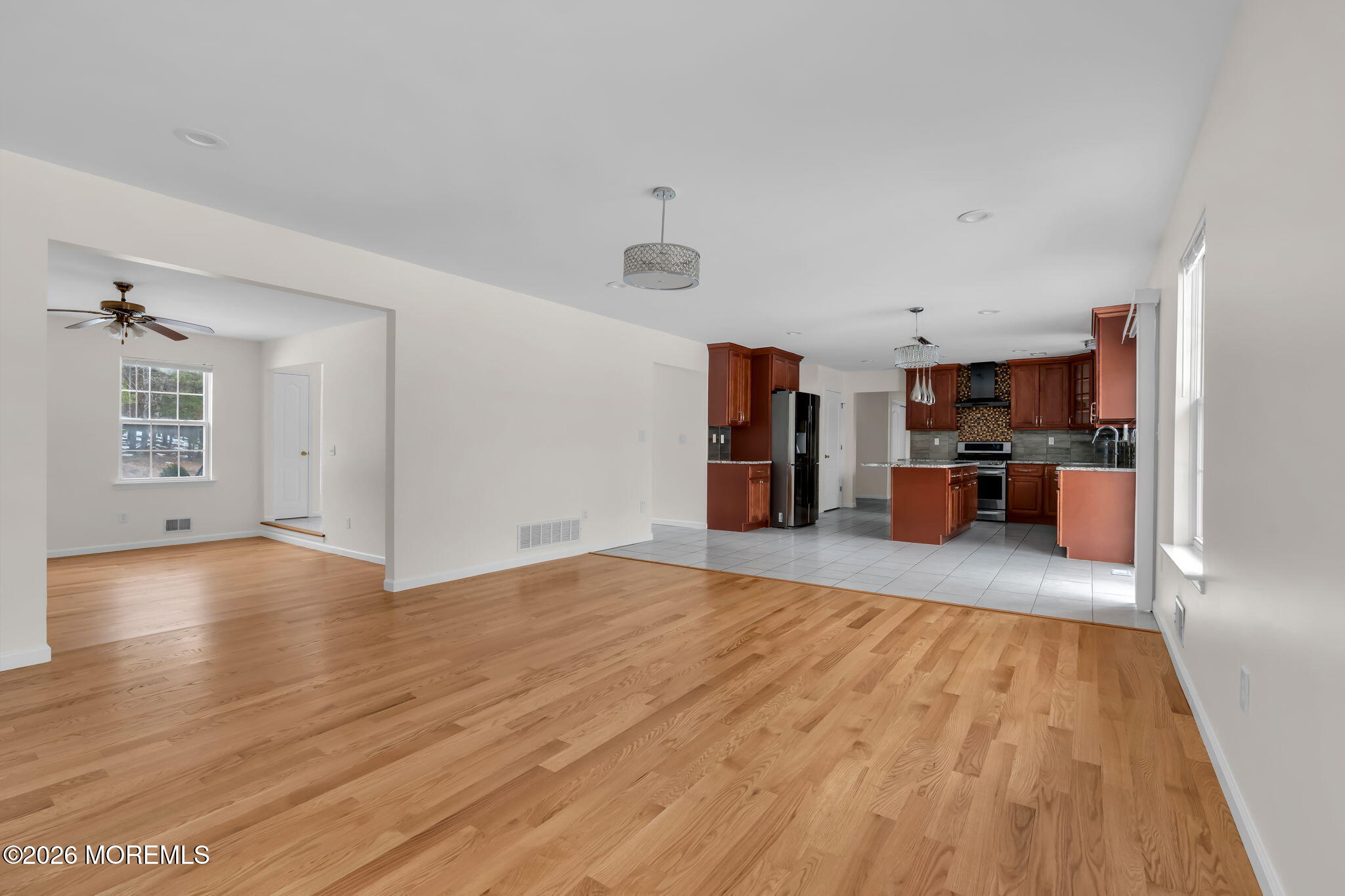 482 Meadowood Road Jackson, NJ 08527 - Photo 44 of 51 a view of kitchen with furniture and wooden floor