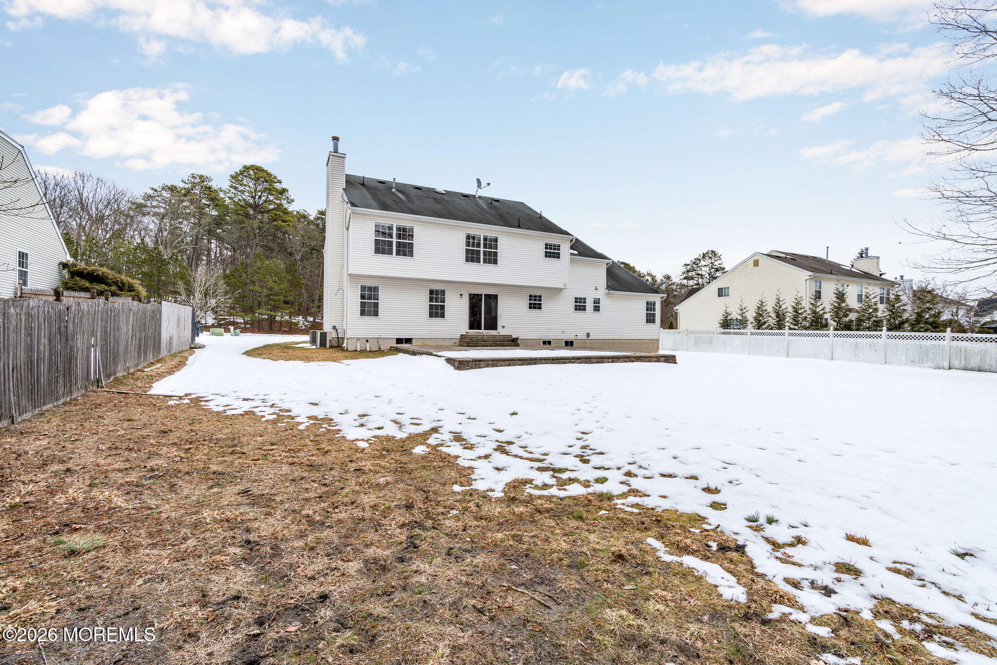 482 Meadowood Road Jackson, NJ 08527 - Photo 10 of 51 a street view covered with snow