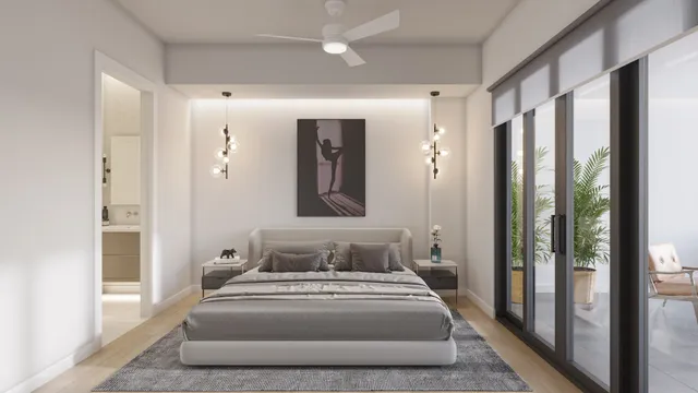 a bedroom with a large bed and a large mirror