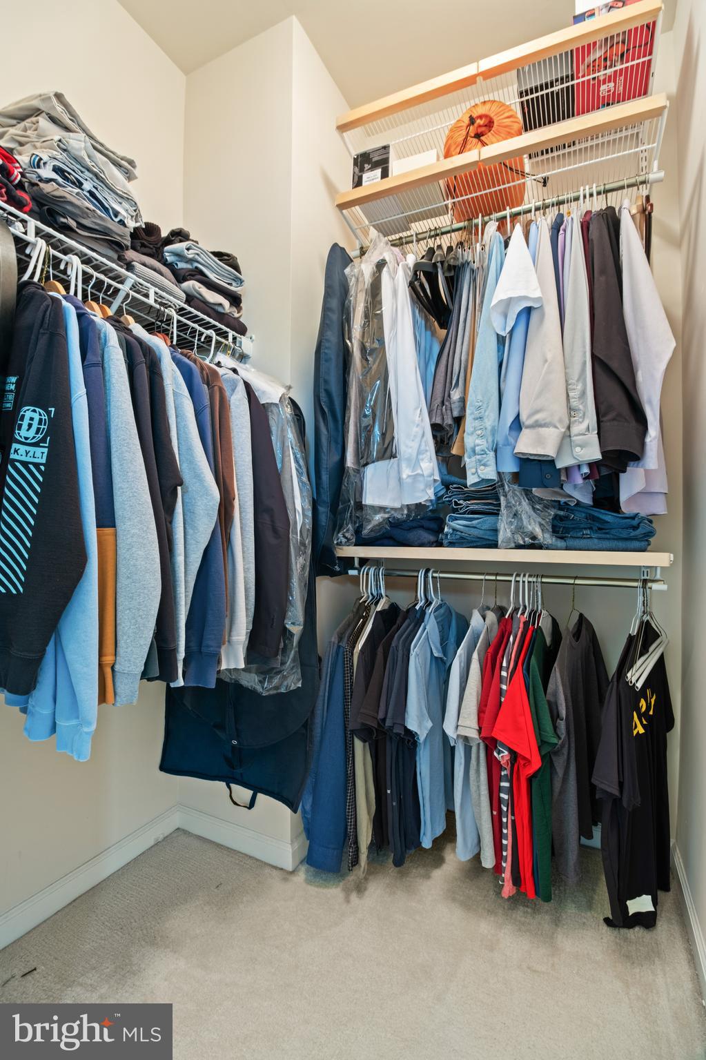 1622 Hardwick Court, Unit 403 Hanover, MD 21076 - Photo 15 of 21 a view of walk in closet with clothes and shoes