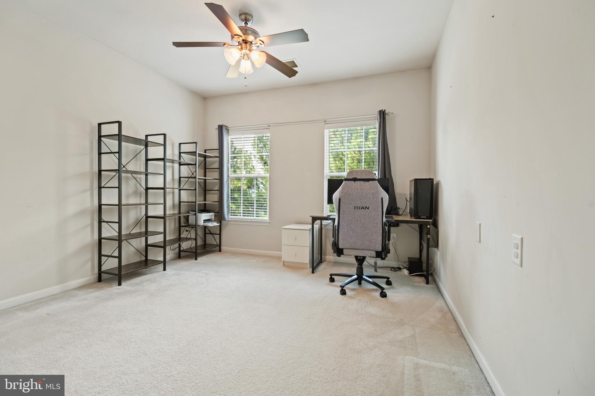 1622 Hardwick Court, Unit 403 Hanover, MD 21076 - Photo 16 of 21 a view of a workspace with furniture and a window