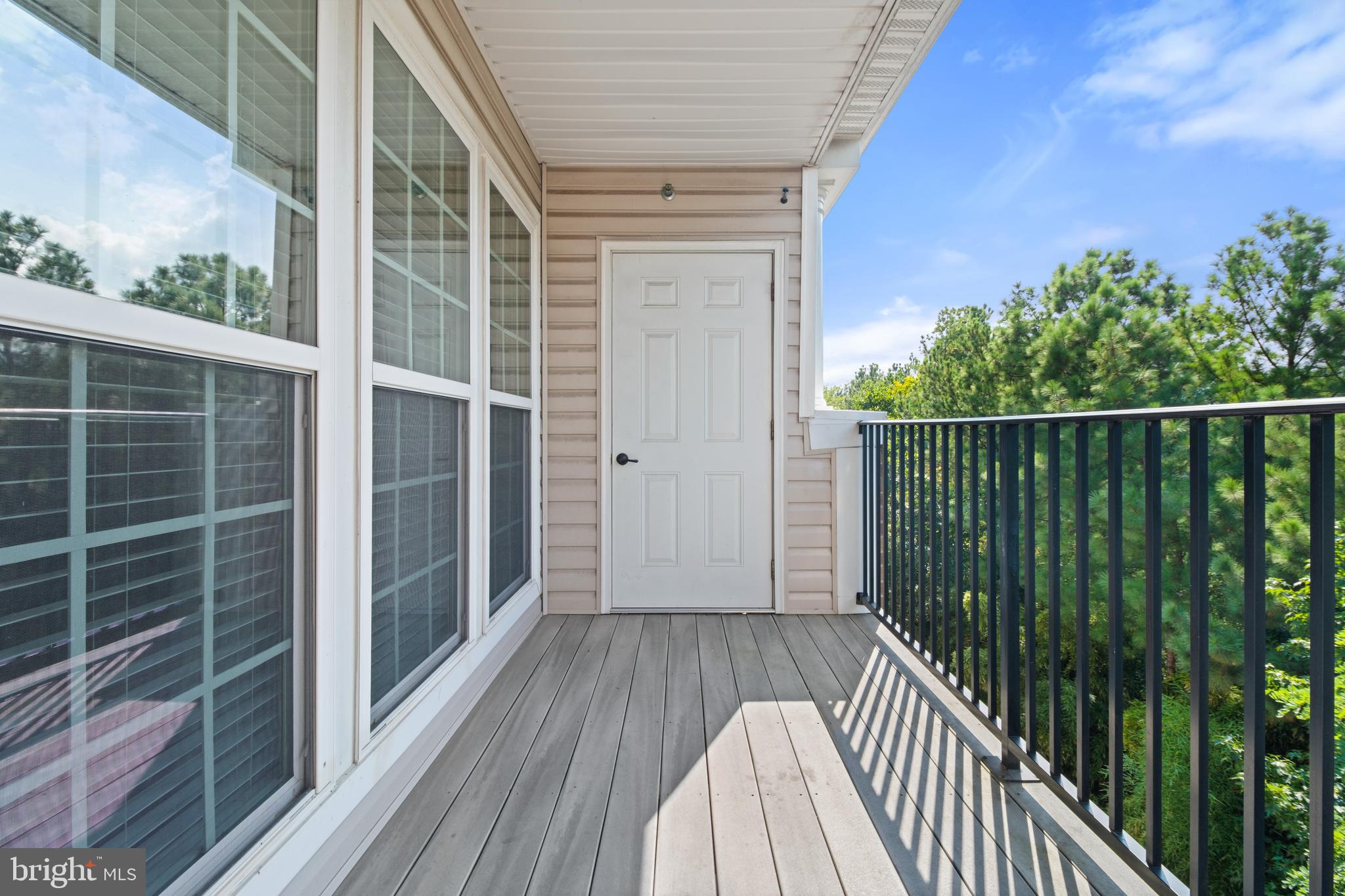 1622 Hardwick Court, Unit 403 Hanover, MD 21076 - Photo 20 of 21 a view of balcony with wooden floor