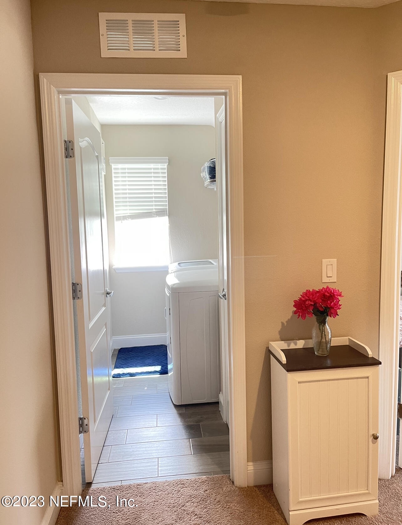 207 Silver Creek Place St. Augustine, FL 32095 - Photo 16 of 32 a bathroom with a sink and a mirror