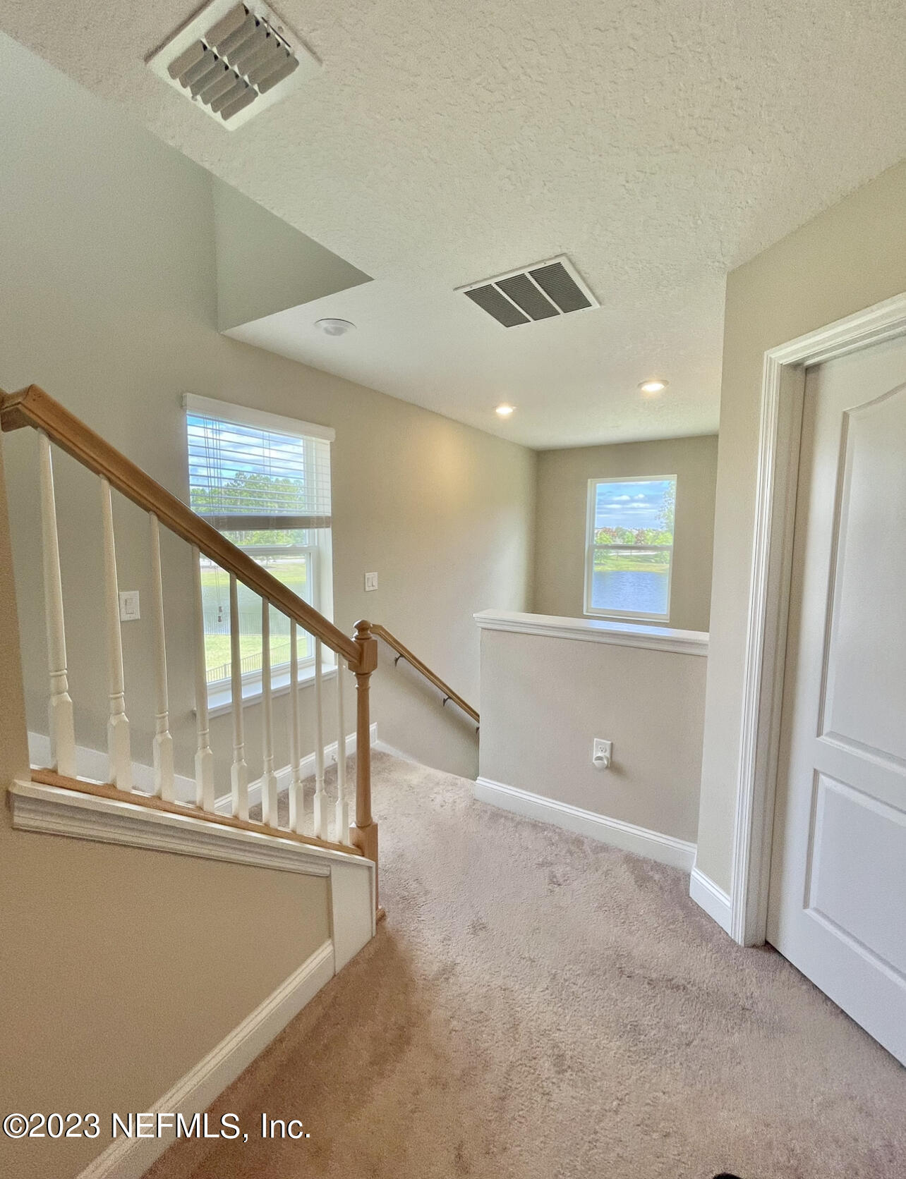 207 Silver Creek Place St. Augustine, FL 32095 - Photo 19 of 32 a view of an entryway with wooden floor