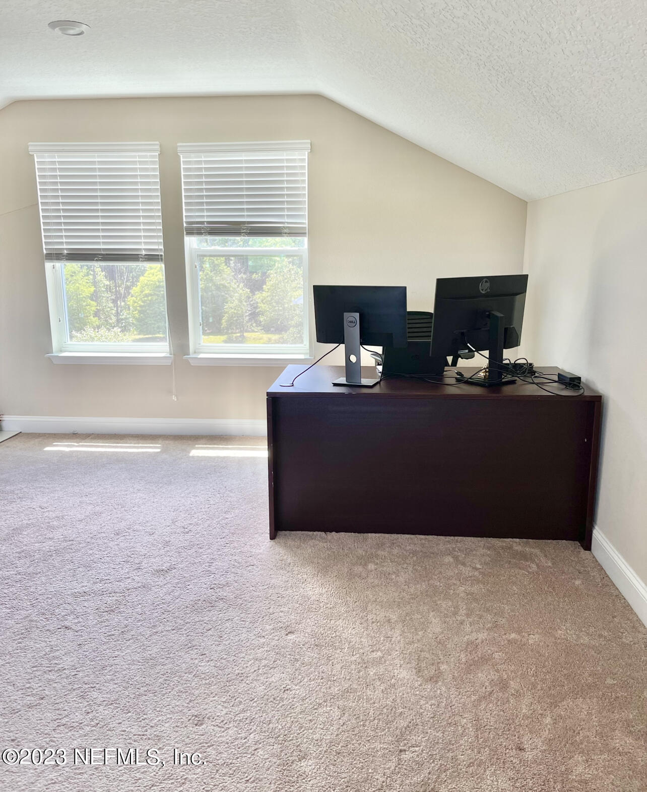 207 Silver Creek Place St. Augustine, FL 32095 - Photo 27 of 32 a living room with furniture and a flat screen tv
